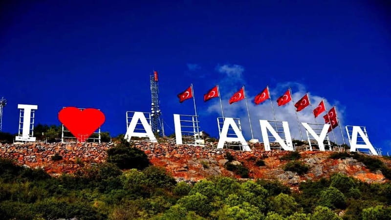 Alanya: City Tour with Sunset Views and Cable Car - Taking the cable car toward Alanya Castle