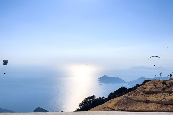 Alanya Paragliding Experience By Local Expert Pilots W/ Transfer - Landing, media, and the return to your hotel