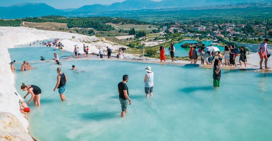 Antalya: Pamukkale Hot Springs & Hierapolis Small Group Tour - Walking the white travertines at Pamukkale