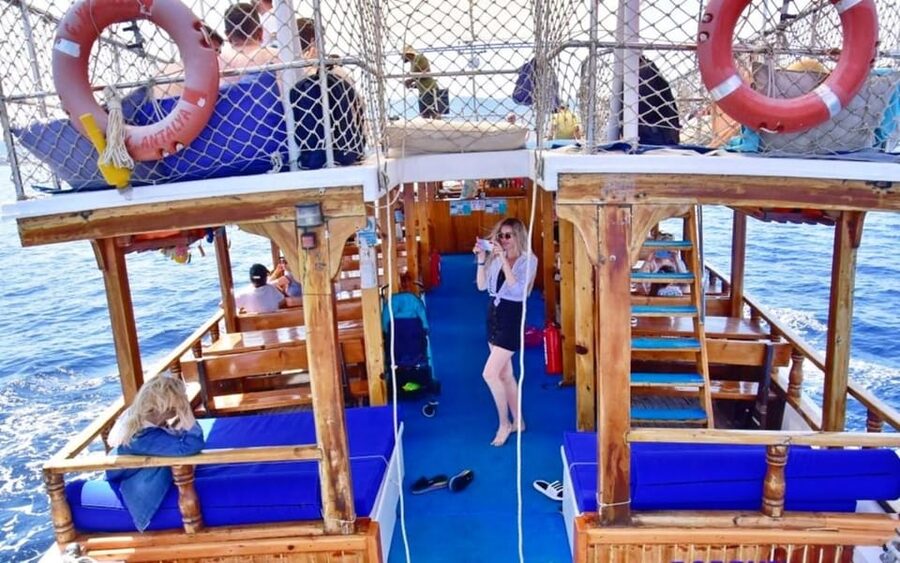 Bodrum Boat Tour with Lunch: Beaches and Islands - Poyraz Bay’s rocky shore