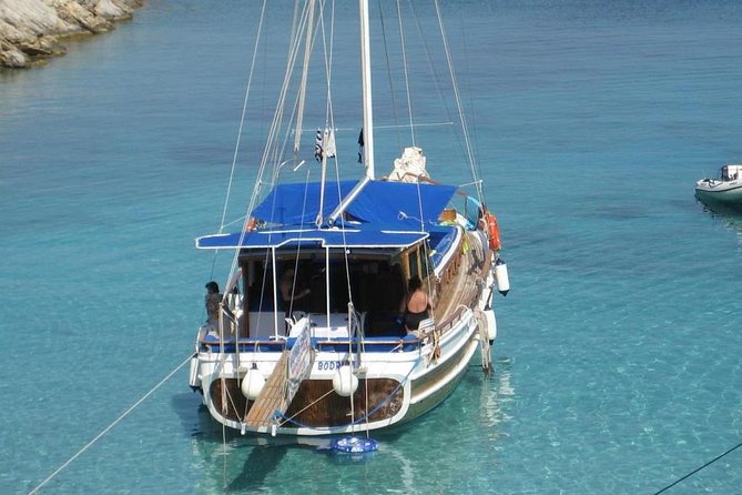 Bodrum Private Gulet Tour with Lunch - Boats, cabins, shade, and swimming gear