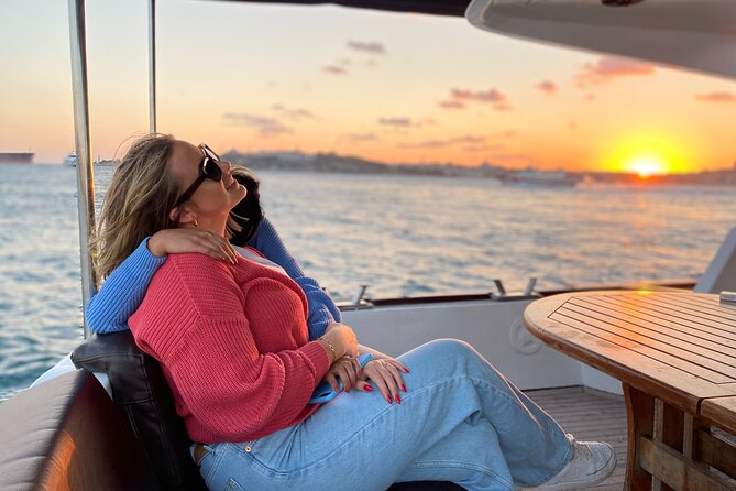 Bosphorus Sunset or Daytime Yacht Cruise with Snacks & Live Guide - Maiden’s Tower and Galata Tower in the changing light