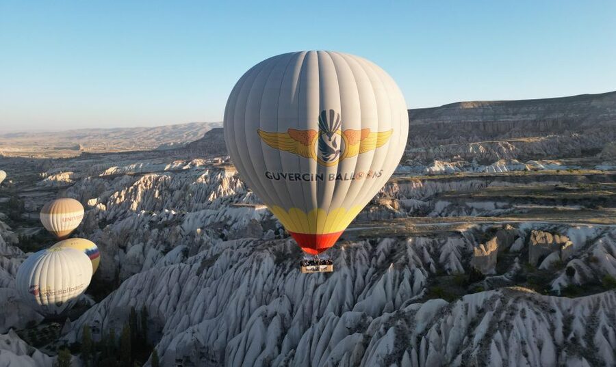 Cappadocia: Fairy Chimneys Sunrise Hot Air Balloon Flight - From a dark hotel pickup to the launch field