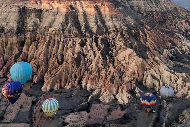 Cappadocia Hot Air Balloon with Pickup, Breakfast & Champagne - Watching the balloon prepare near Love Valley