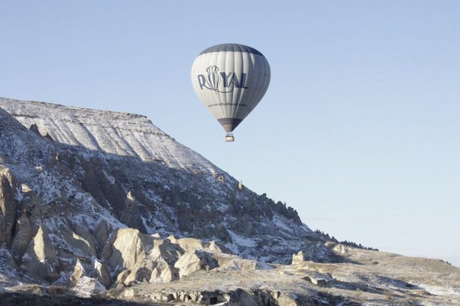 Cappadocia: Royal Queen Hot Air Balloon Tour at Sunrise - A landing celebration with champagne and medals