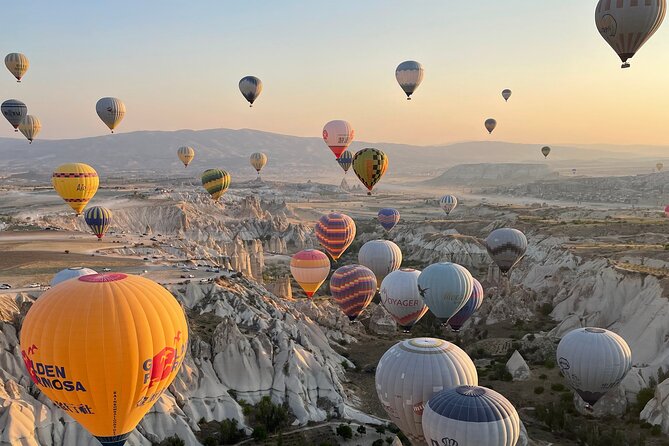 Cappadocia Sunrise Hot Air Balloon Flight / Discovery Balloons - Taking off over Göreme National Park