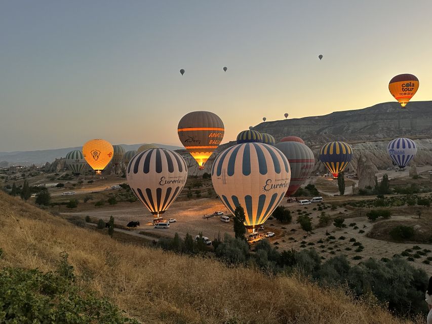 Cappadocia: Sunrise Hot Air Balloon Watching Tour - Stop one: the balloons being prepared near Göreme