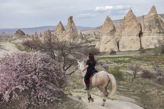 Cappadocia Sunset Horse Riding through the Valleys and Fairy Chimneys - Red Valley in the evening light