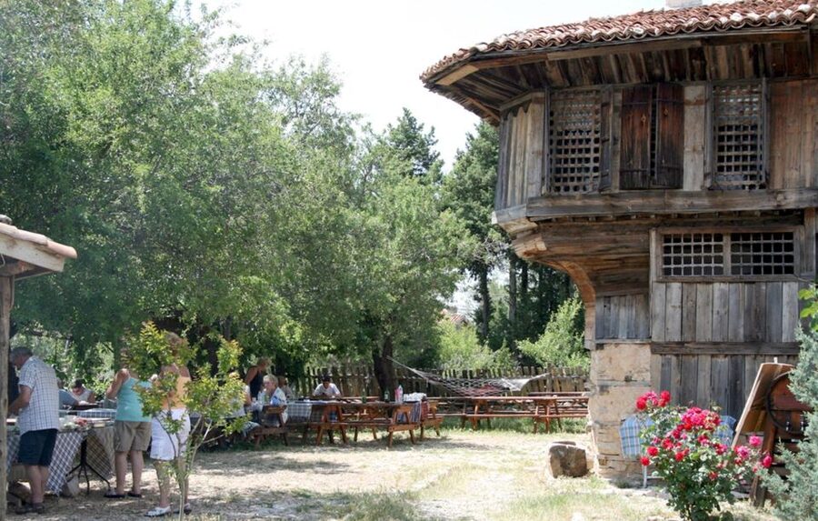 City of Side: Altinbesik Cave and Ormana Tour with Boat Ride - Entering Altınbesik Cave by inflatable boat