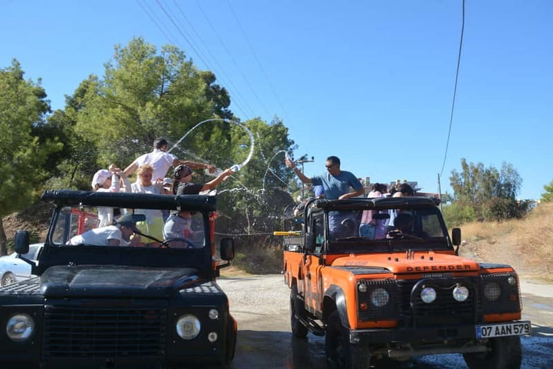 From Alanya: Jeep Safari with Lunch, Dim River & Cave - Water fights between the jeeps