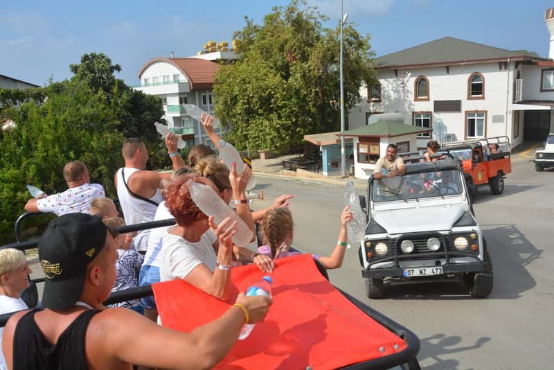 From Alanya: Jeep Safari with Lunch, Dim River & Cave - A Turkish village, fresh fruit, and local shopping
