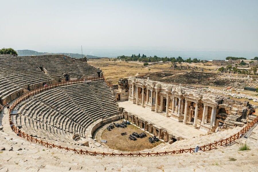 From Antalya/Kemer: Pamukkale and Hierapolis Tour with Lunch - Walking through Hierapolis before the heat builds