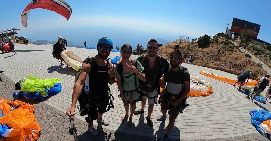 From Fethiye: Oludeniz Paragliding Trip with Transfer - From Fethiye to the Liberty office