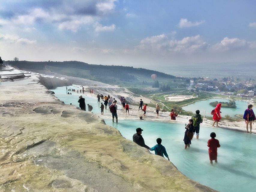 From Kusadasi and Selcuk: Pamukkale and Hiearapolis Tour - Walking onto Pamukkale’s calcium terraces