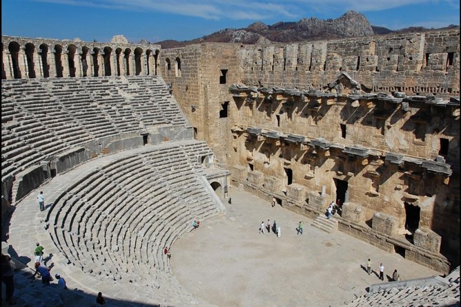 Full-Day Tour of Kursunlu Waterfalls, Aspendos, and Ancient Ruins of Side From Alanya - Kursunlu Waterfalls among pines and stone