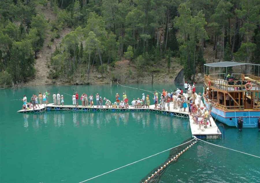 Green Canyon: Boot Tour with Lunch, Soft Drinks, & Transfer - Swimming in cool turquoise water