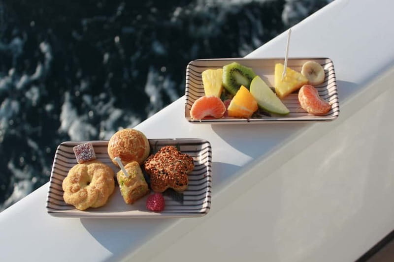 Istanbul: Bosphorus Private Guided Yacht Cruise with Snacks - Canapés, fruit, and mint lemonade on board