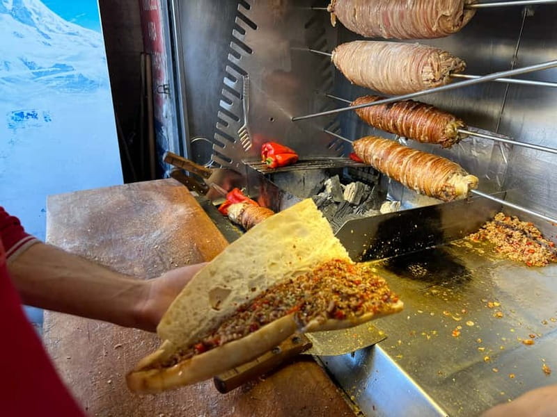 Istanbul: Guided Food Tour with Ferry Ride and Tastings - A Turkish breakfast with simit, kaymak, and menemen