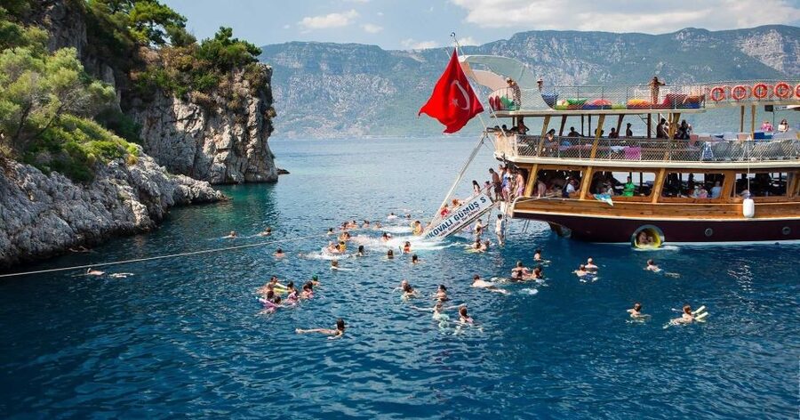 Marmaris: Cleopatra Island Boat Trip with Lunch and Transfer - Cleopatra Island: beach, ruins, and extra cost