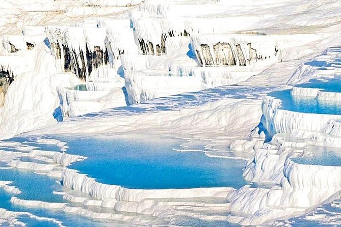 Pamukkale Small Group Tour From Kusadasi or Selcuk Hotels - Hierapolis, the Holy City above Pamukkale