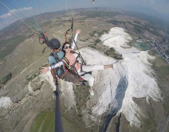 Pamukkale: Tandem Paragliding with Ancient Hierapolis Views - Cotton Castle, Hierapolis, and the thermal springs below