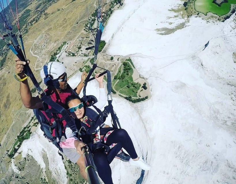 Pamukkale: Tandem Paragliding with Ancient Hierapolis Views - Landing, photos, and the extra cost